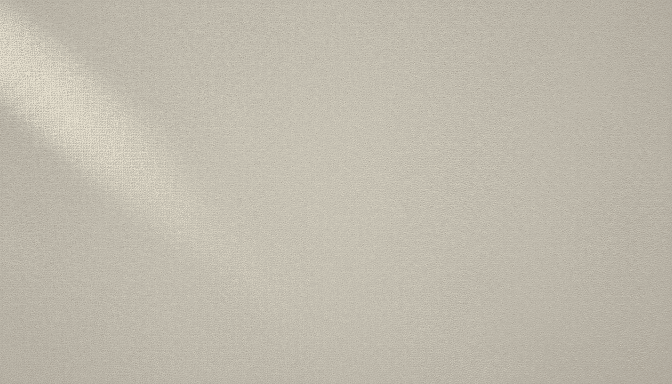 Freshly rendered exterior wall with smooth cream finish